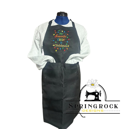 Black apron with colorful text on a mannequin, branded with Springrock Designs.