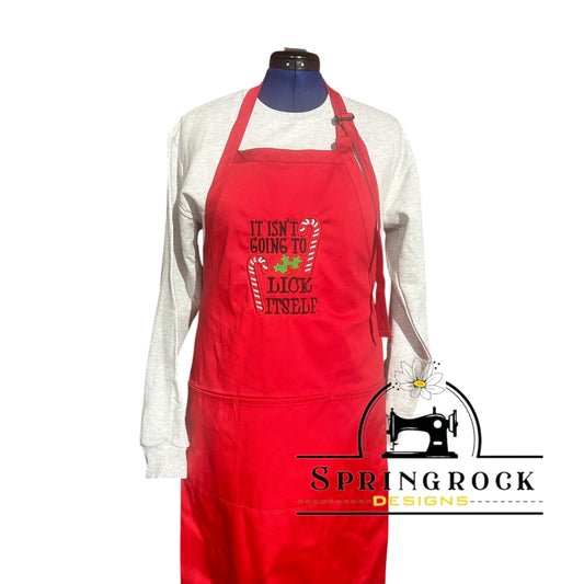 IT ISN'T GOING TO LICK ITSELF embroidered apron RED