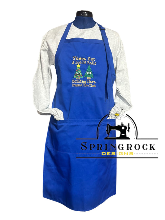 Blue apron with humorous design on a mannequin